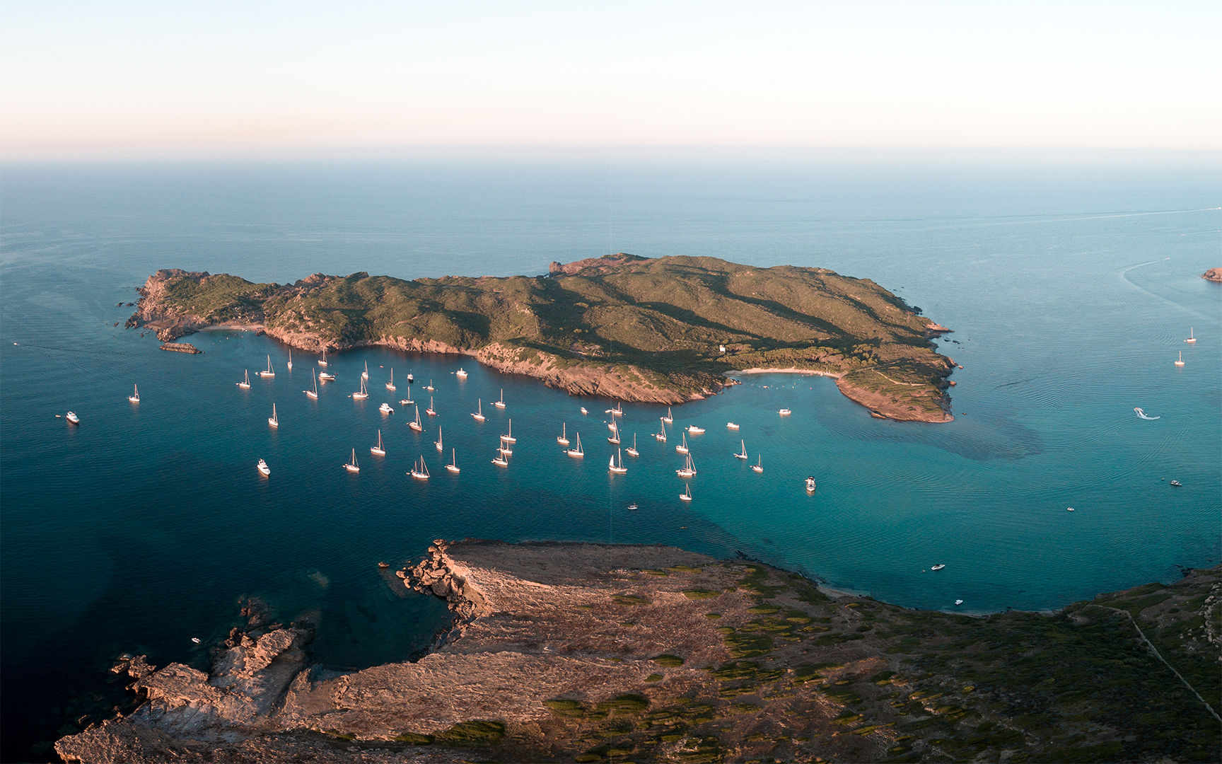 menorca spain island colom drone llaut excursion boat rental